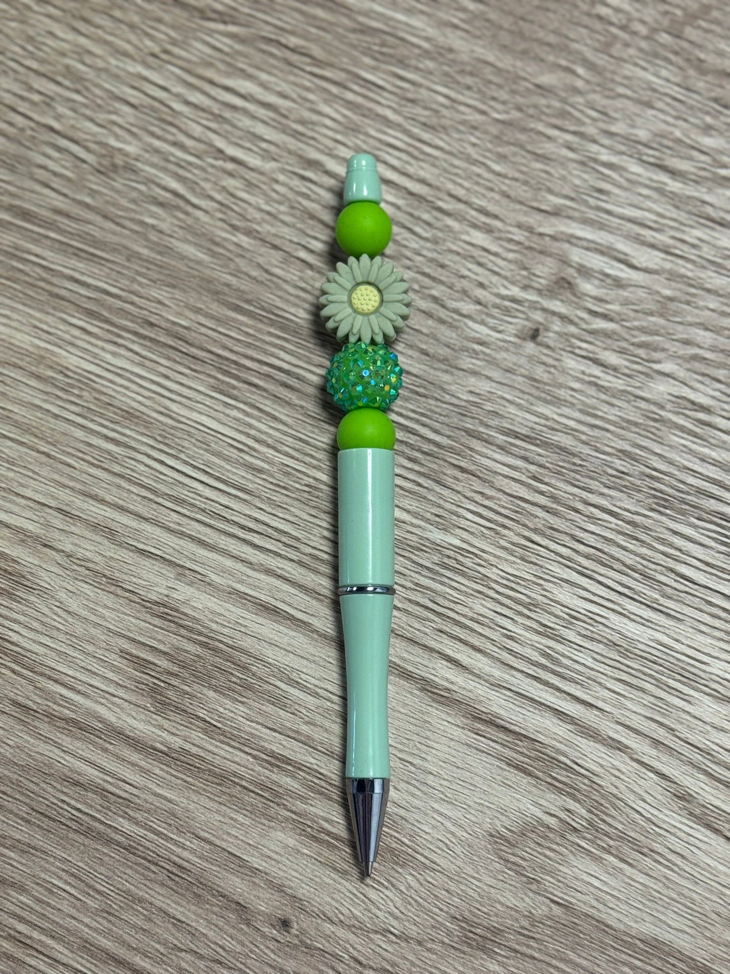 Pen met bloemetje (groen)